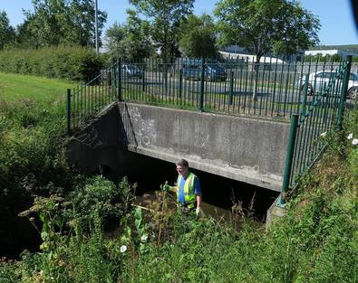Gerry cleaning up Whitestown Stream